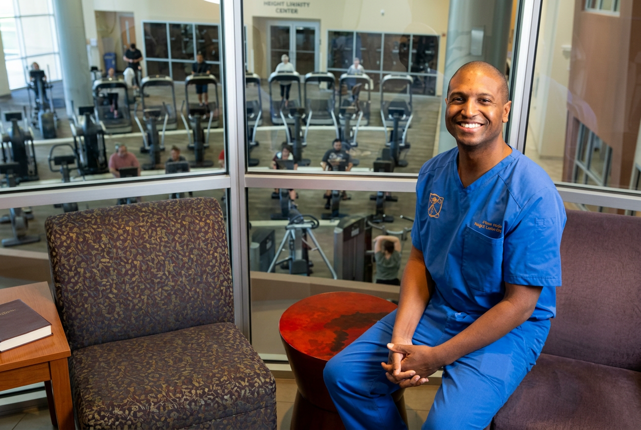 Scott M. Perryman, MD, FACS, FASMBS in scrubs at the wellness center.
