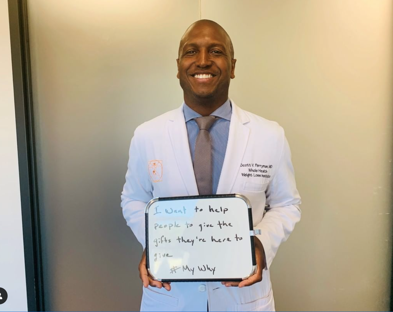 Scott M. Perryman, MD, FACS, FASMBS holding a whiteboard that reads: "I want to help people to give the gifts they're here to give. #MyWhy"